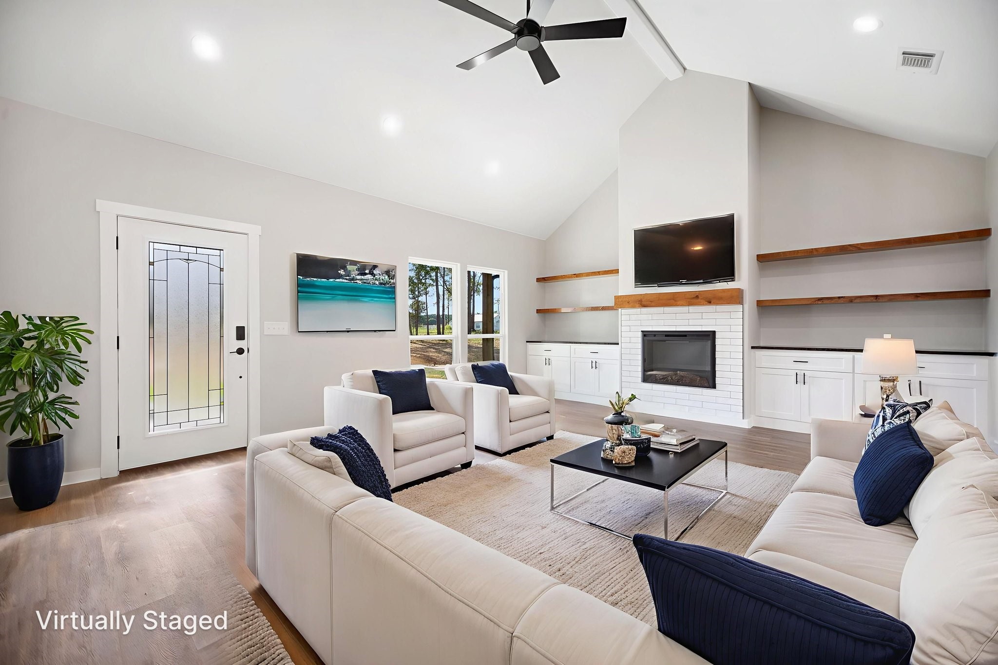 1575 Fm 844 Huntington, TX 75949 - Photo 10 of 40 a living room with furniture a fireplace and a flat screen tv
