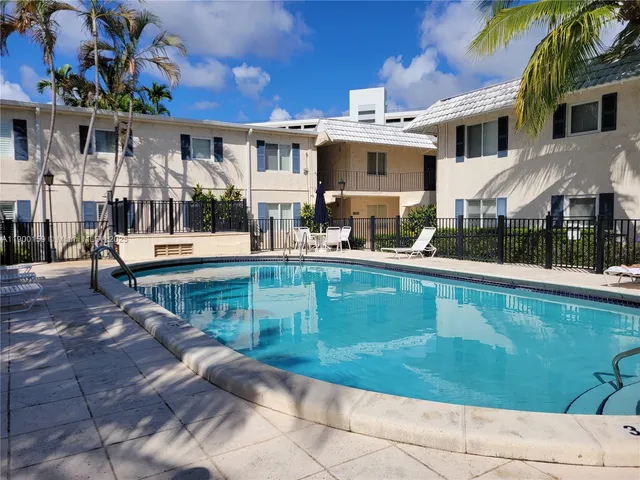 a view of a house with a swimming pool