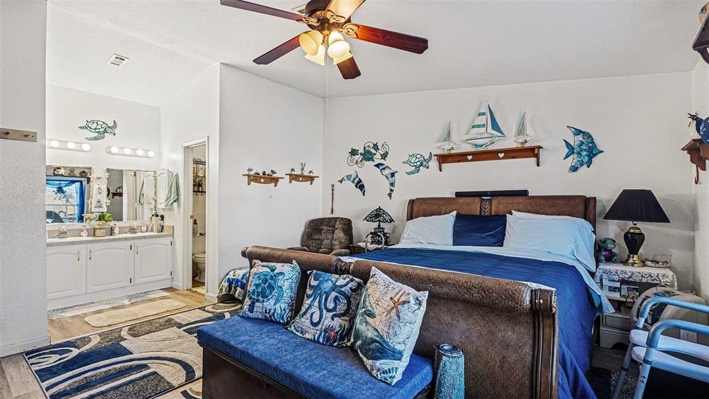 6300 East Sage Street Inverness, FL 34452 - Photo 14 of 32 a living room with furniture and wooden floor