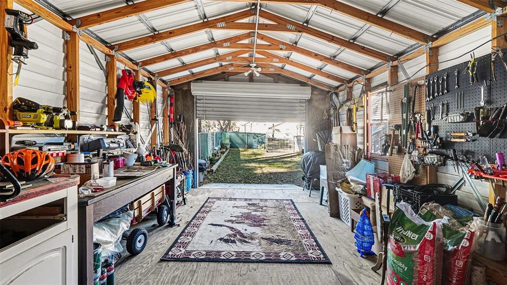6300 East Sage Street Inverness, FL 34452 - Photo 27 of 32 a view of a storage room with a lot of stuff