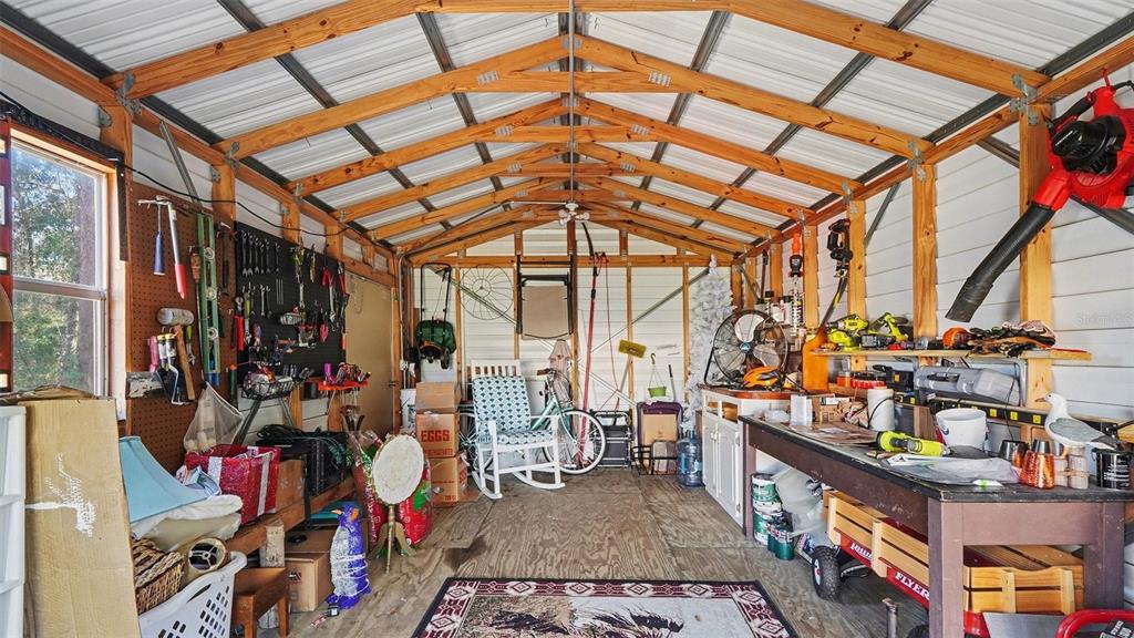 6300 East Sage Street Inverness, FL 34452 - Photo 28 of 32 a view of gym equipment and children play room