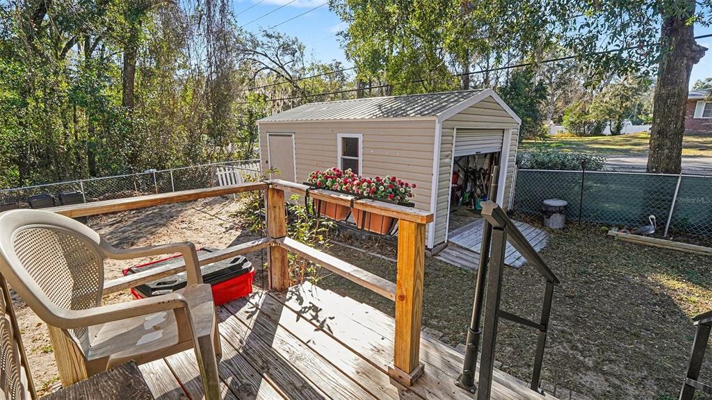 6300 East Sage Street Inverness, FL 34452 - Photo 30 of 32 a view of a house with backyard