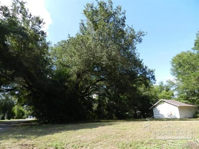 a view of swimming pool with a yard