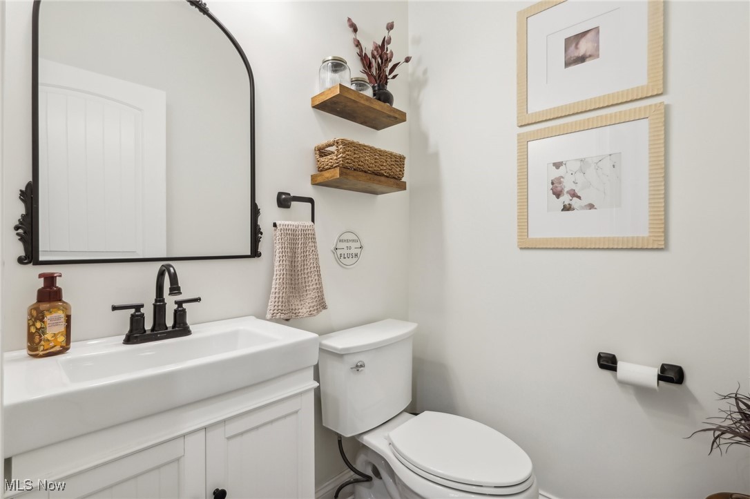 6172 Case Road North Ridgeville, OH 44039 - Photo 15 of 49 Half Bathroom with toilet and sink