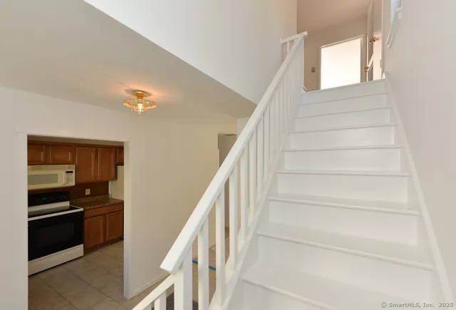 a view of a room with large windows