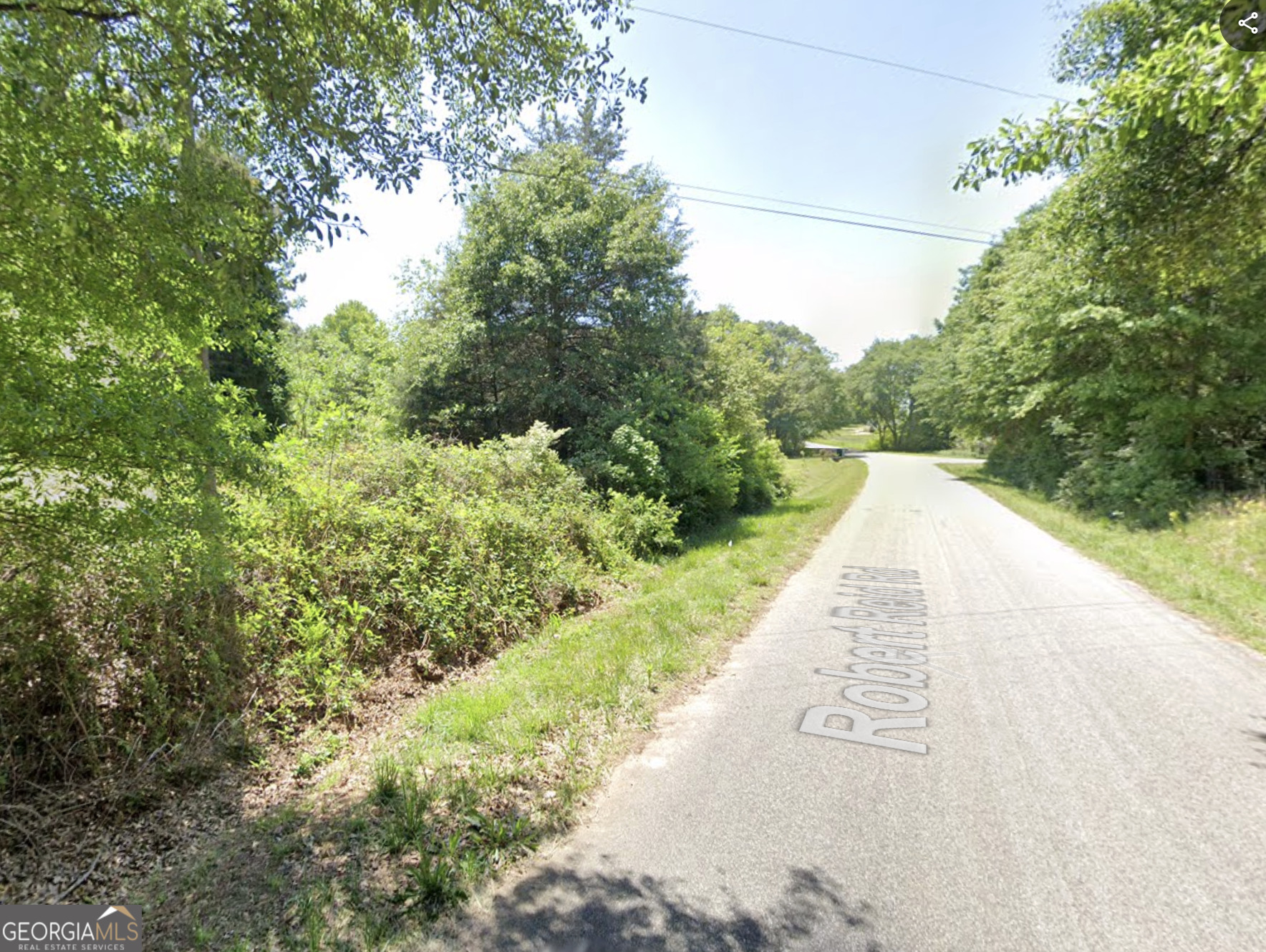 825 Robert Reid Road Royston, GA 30662 - Photo 2 of 4 a view of a pathway with a park