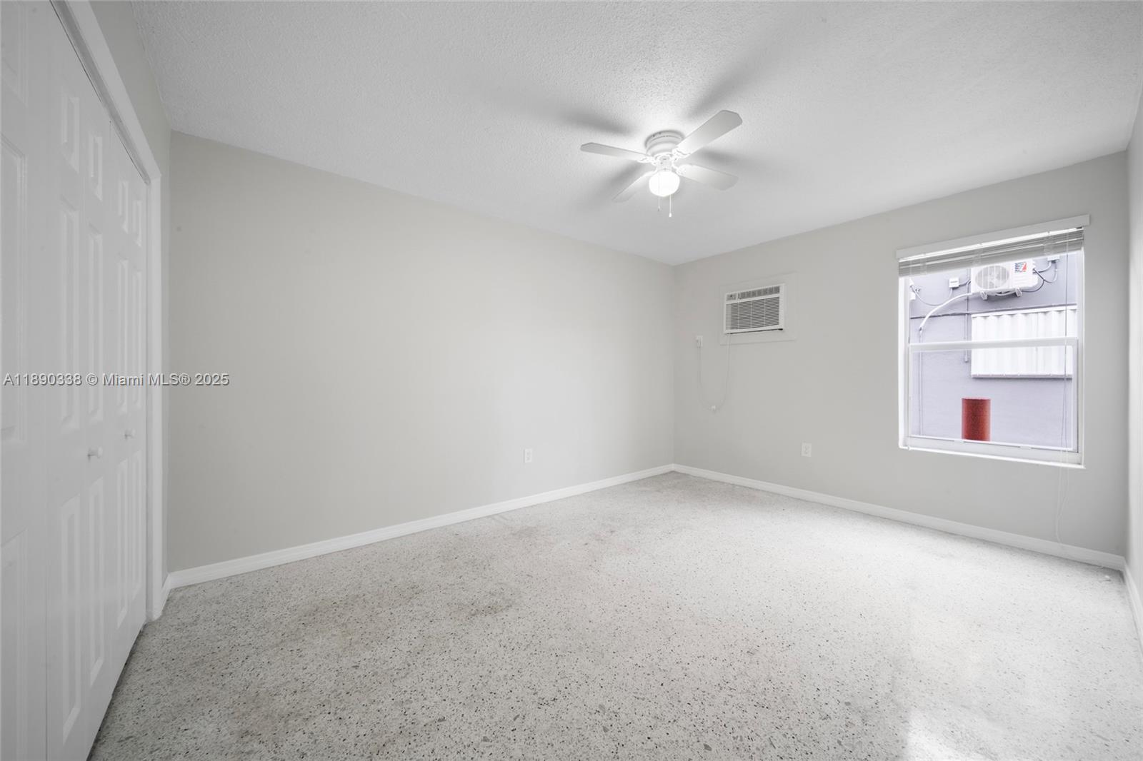 40 West 4th Street, Unit 2 Hialeah, FL 33010 - Photo 23 of 44 a view of an empty room with a window