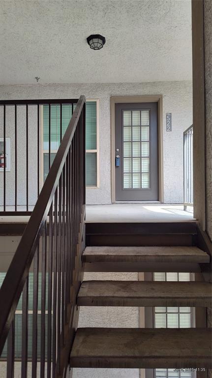6108 Abrams Road, Unit 522 Dallas, TX 75231 - Photo 2 of 14 View of staircase