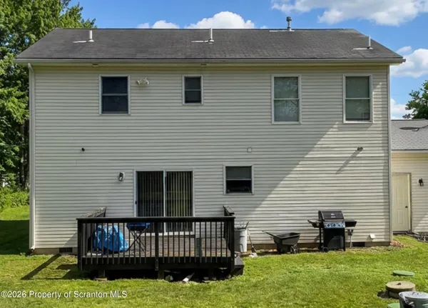 a front view of a house with yard