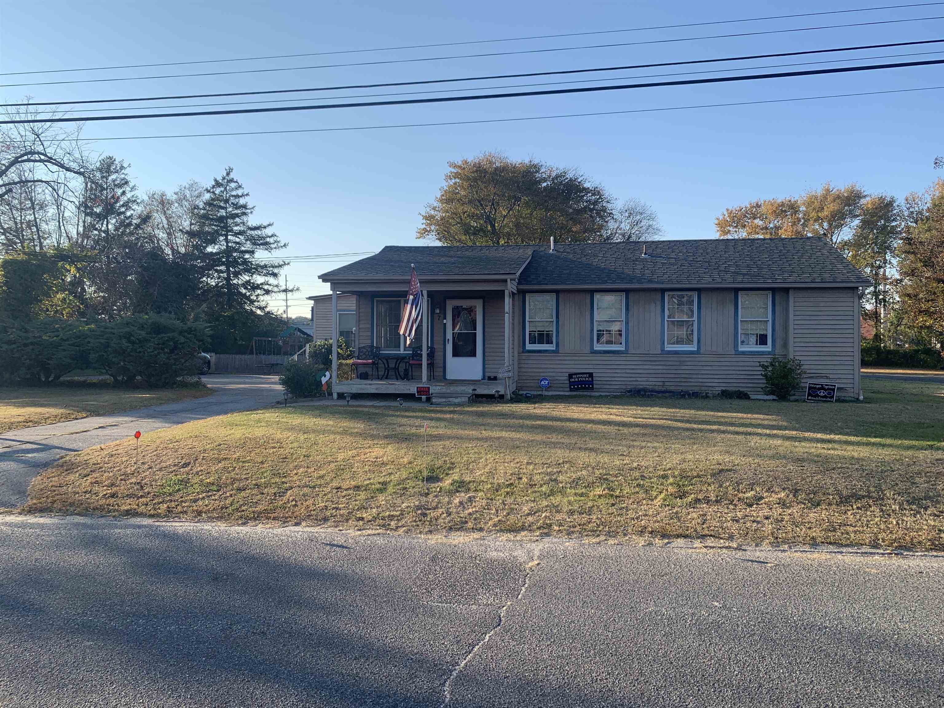 7 School Rio Grande, NJ 08242 - Photo 1 of 13 a front view of a house with a yard