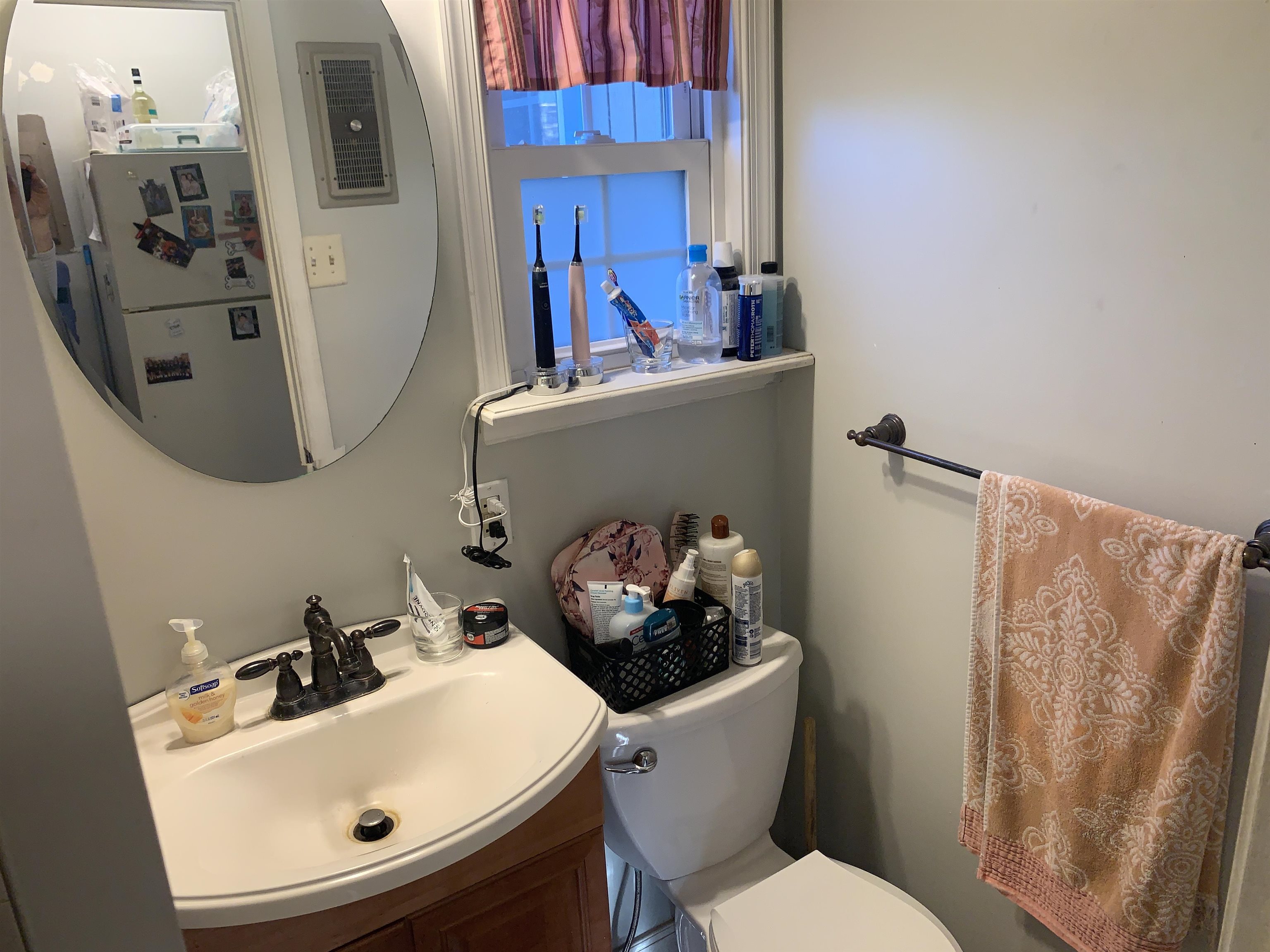 7 School Rio Grande, NJ 08242 - Photo 12 of 13 a bathroom with a sink mirror and toilet