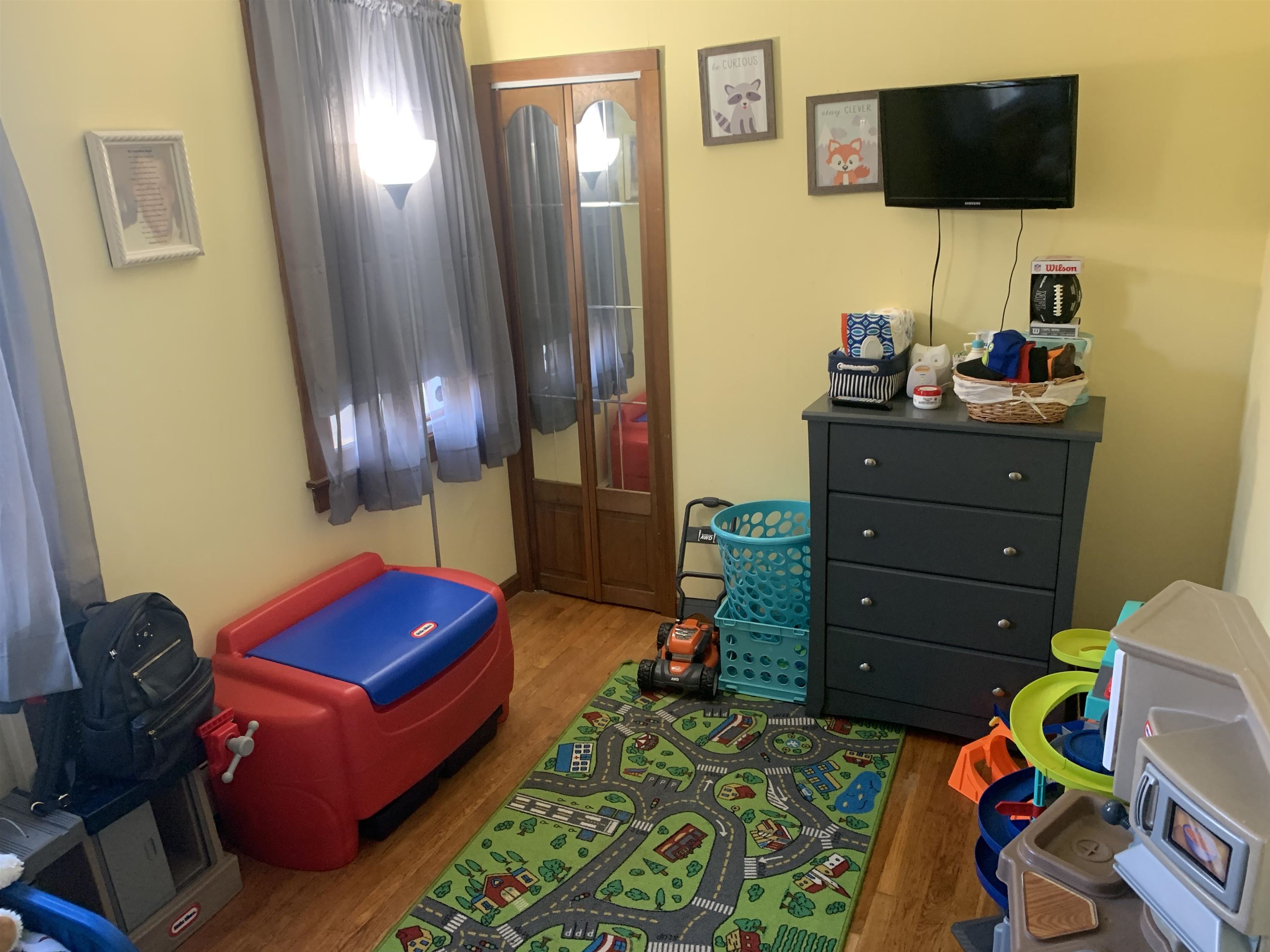 7 School Rio Grande, NJ 08242 - Photo 7 of 13 a bedroom with a bed and a flat screen tv