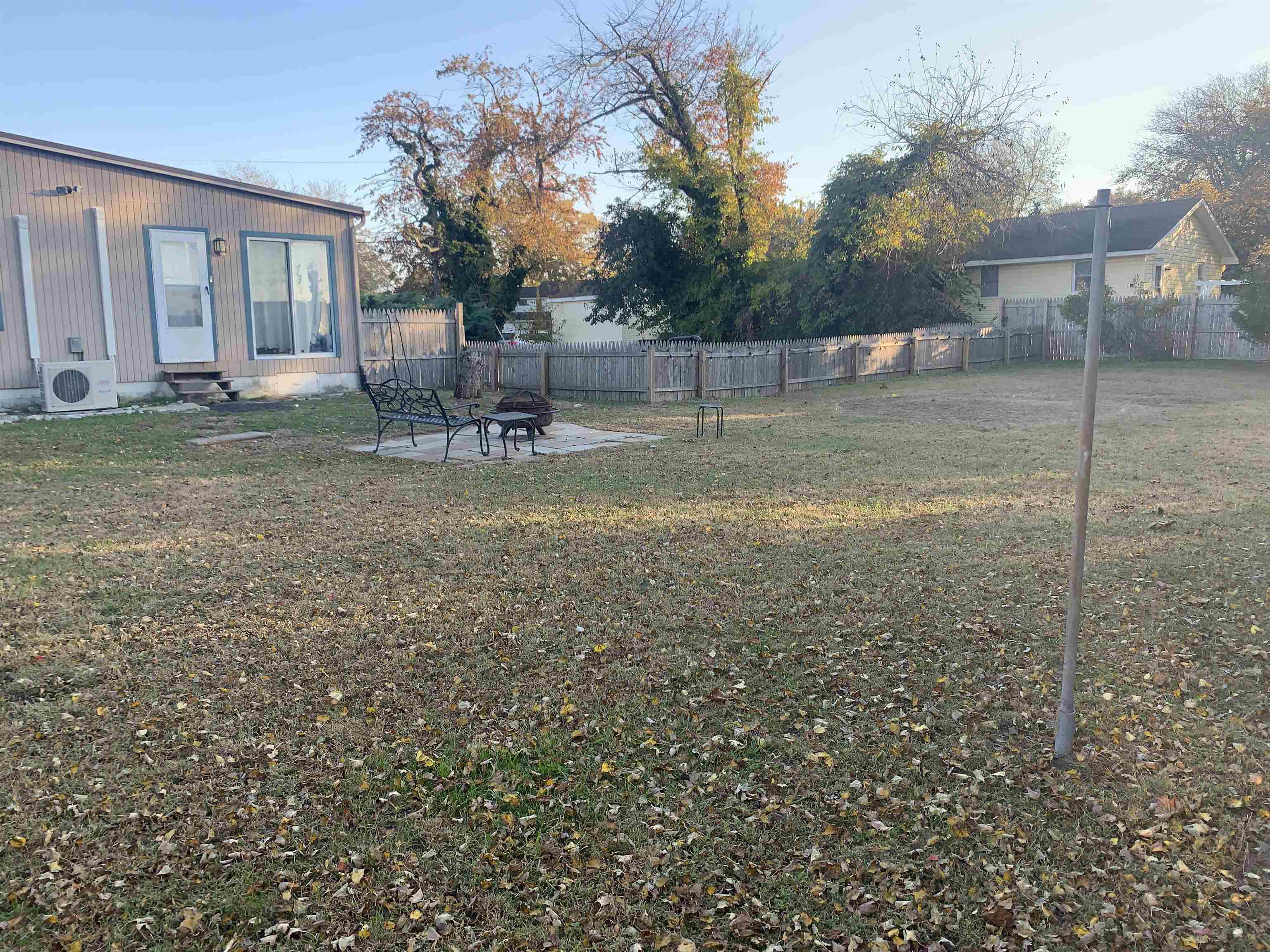 7 School Rio Grande, NJ 08242 - Photo 9 of 13 a backyard of a house with table and chairs