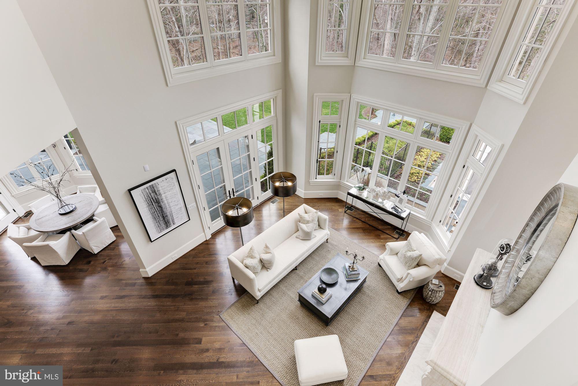 906 Turkey Run Road McLean, VA 22101 - Photo 15 of 52 a living room with furniture and floor to ceiling windows