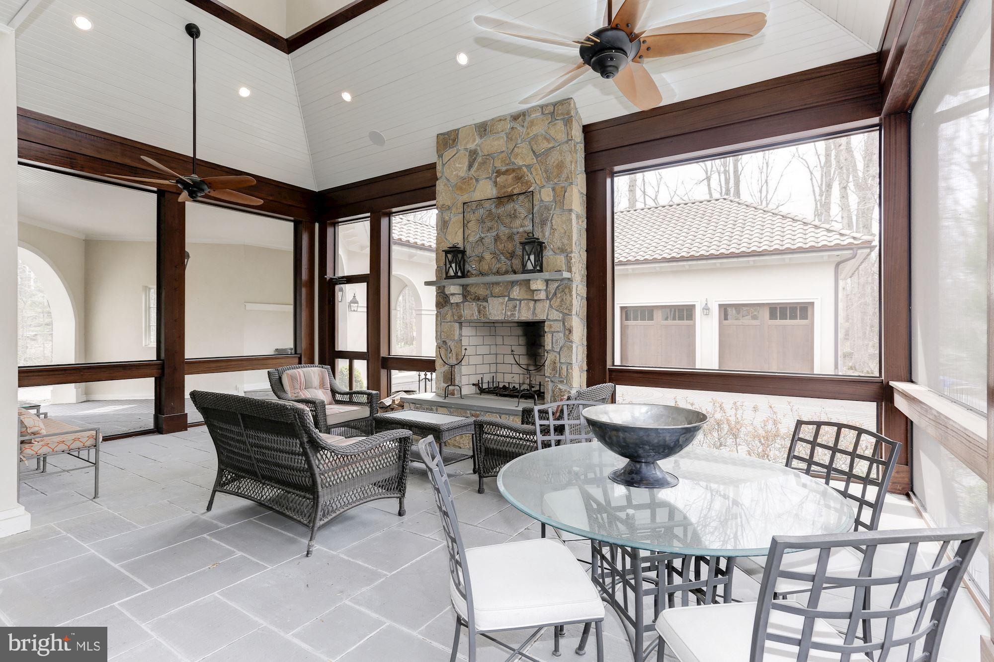 906 Turkey Run Road McLean, VA 22101 - Photo 20 of 52 a living room with furniture and a large window