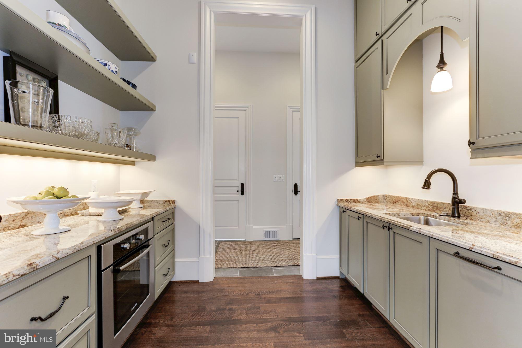 906 Turkey Run Road McLean, VA 22101 - Photo 23 of 52 a kitchen with a sink and a stove