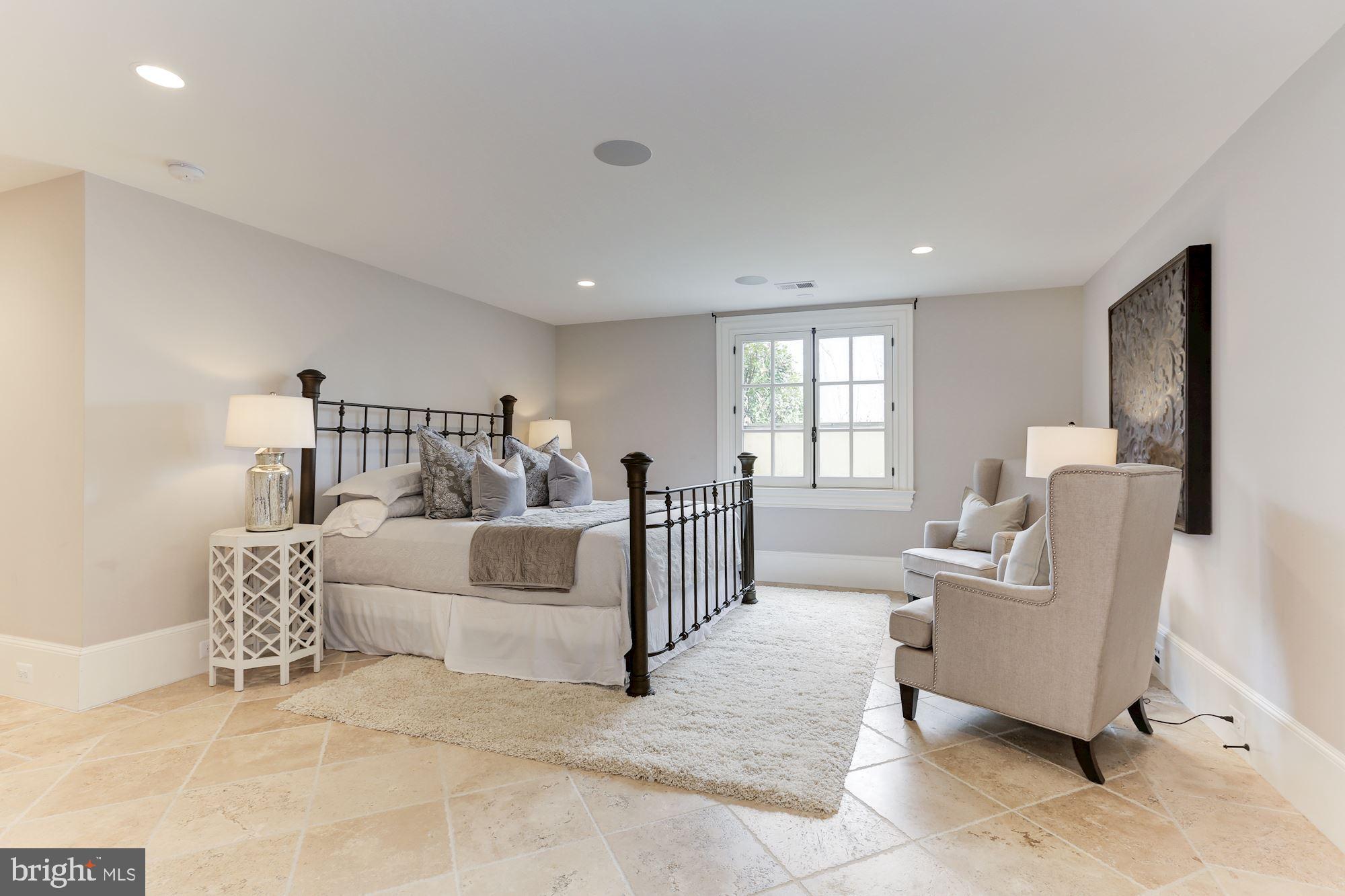 906 Turkey Run Road McLean, VA 22101 - Photo 40 of 52 a living room with furniture and a window