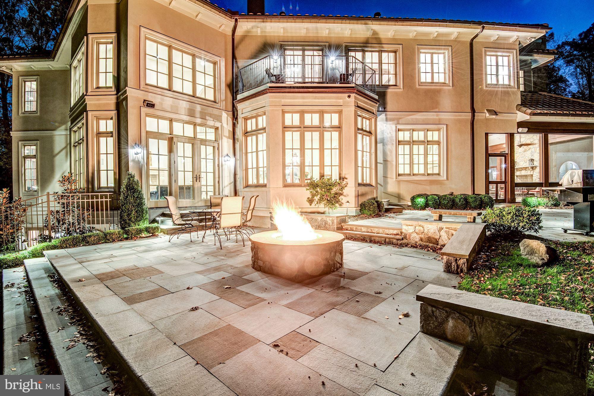 906 Turkey Run Road McLean, VA 22101 - Photo 51 of 52 a view of a patio with couches and potted plants