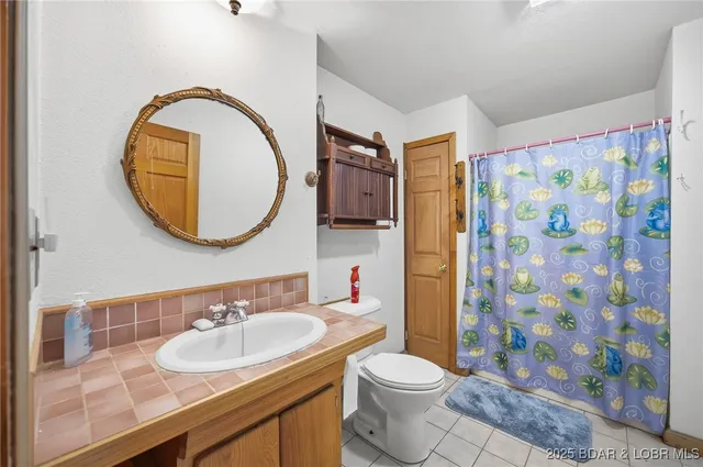 $699,900 | 27394 Cross Lane, Barnett, MO 65011