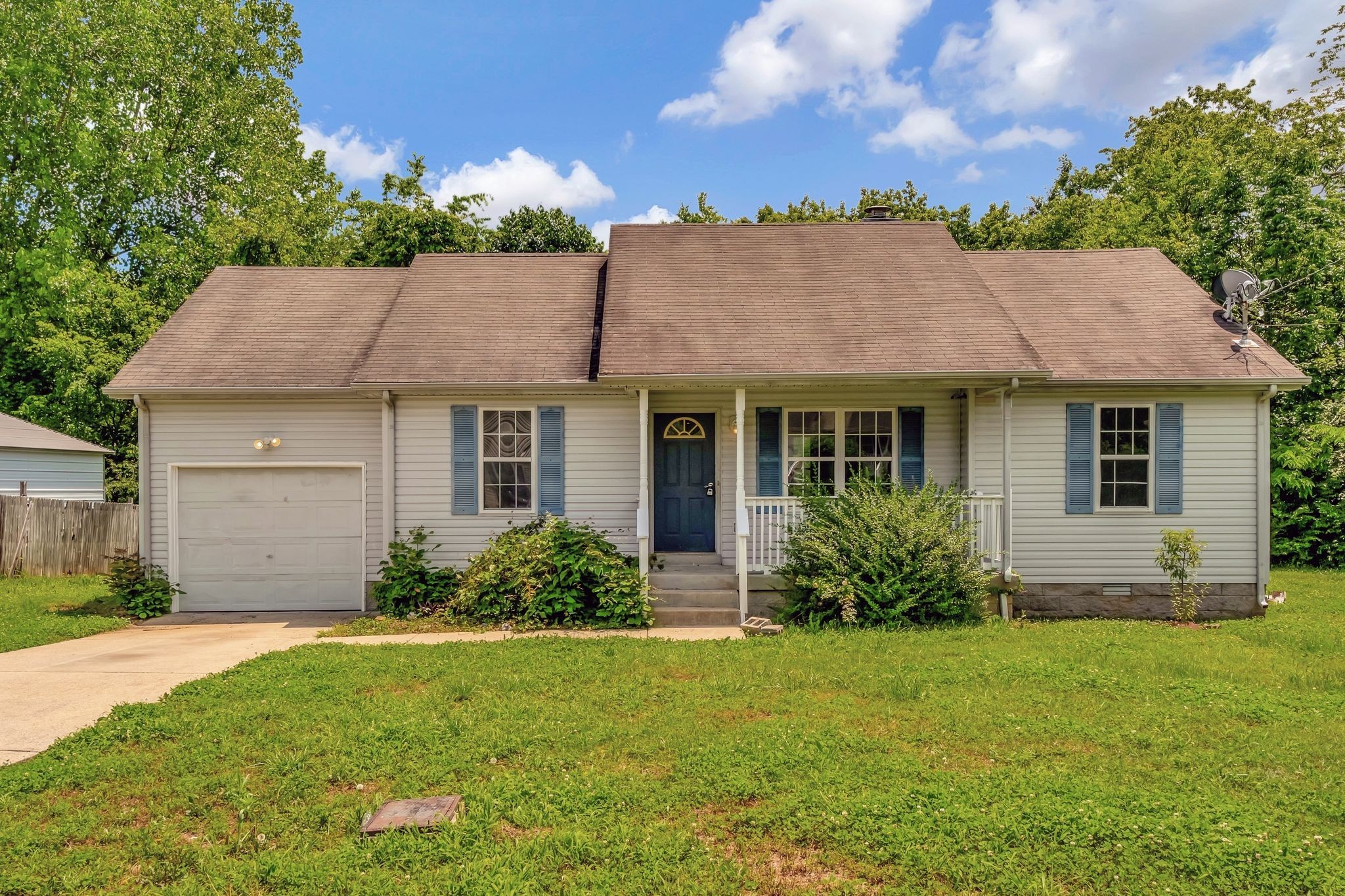 609 Big Riv Run Antioch, TN 37013 - Photo 1 of 24 a view of a house with garden and yard