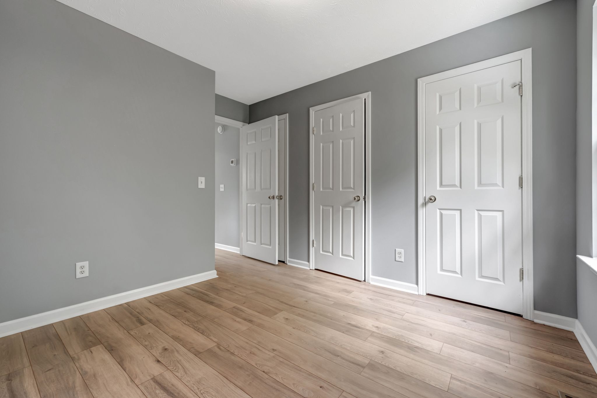 609 Big Riv Run Antioch, TN 37013 - Photo 15 of 24 a view of an empty room with wooden floor