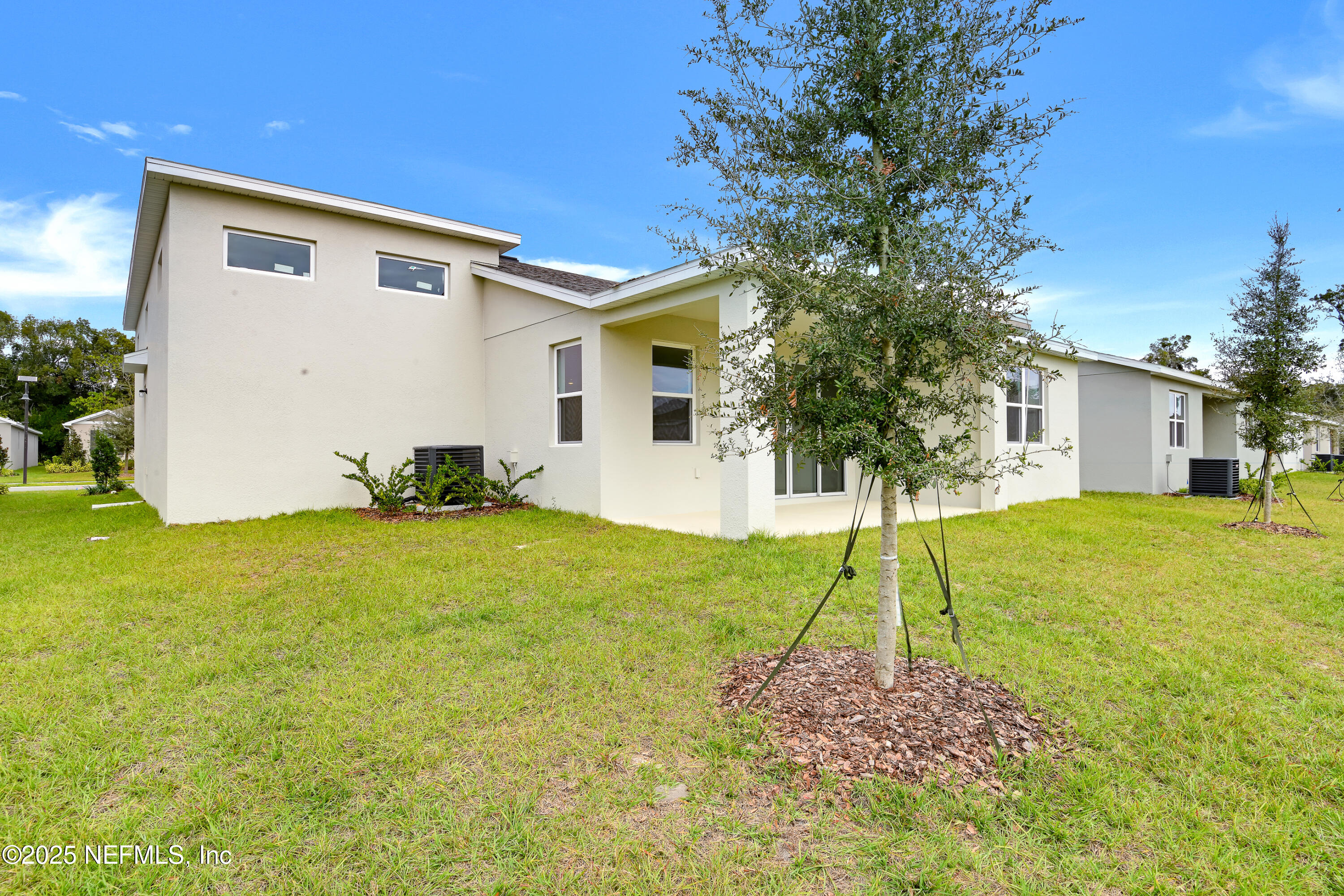 328 Alexandrite Street DeLand, FL 32720 - Photo 16 of 16 a house view with a backyard space