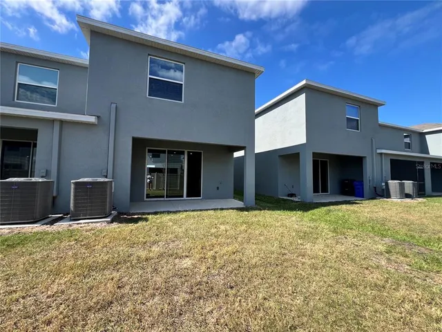 a house with yard in front of it