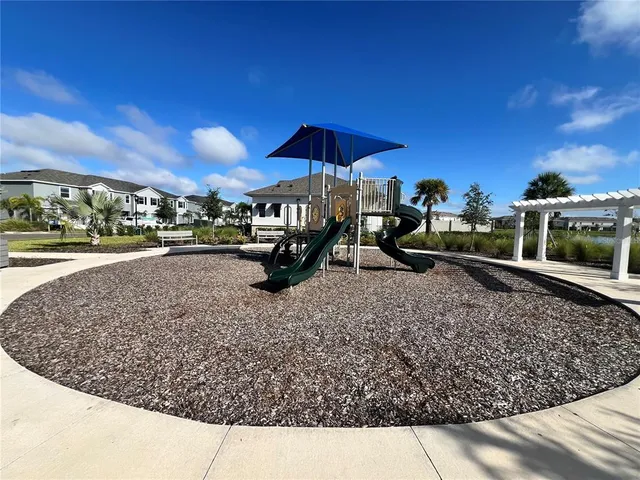 a view of a park with slide