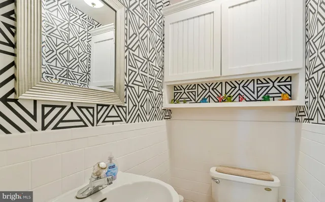 a bathroom with a sink and a toilet