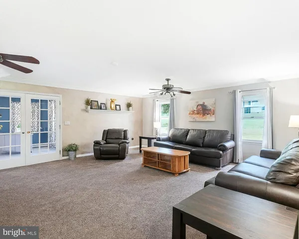 a living room with furniture and a couch