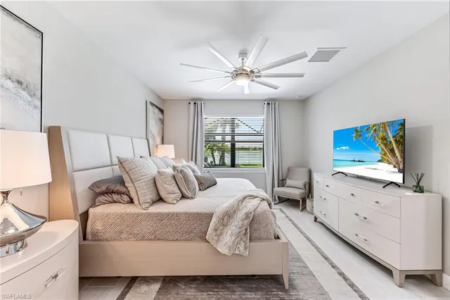 a bathroom with a sink toilet a mirror and shower