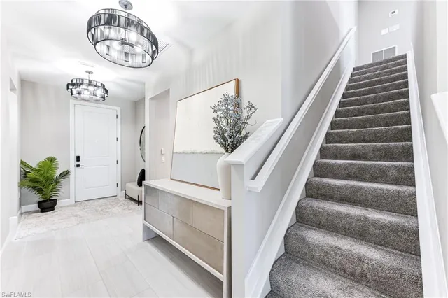 a view of swimming pool with seating area