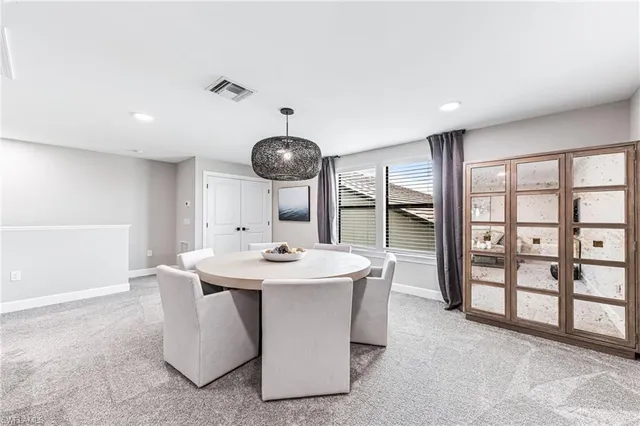 a view of swimming pool with a patio