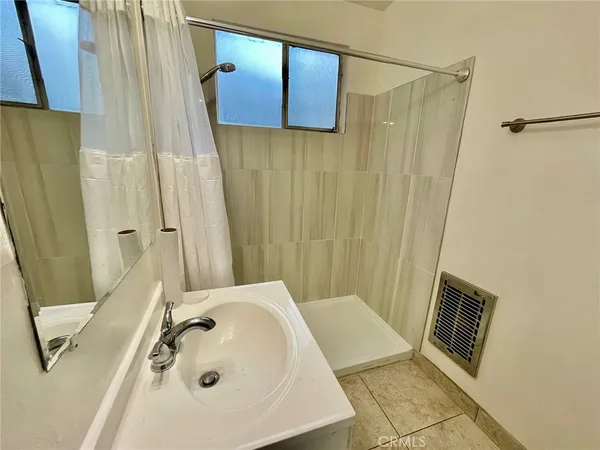 a view of a bathroom with a sink and a toilet