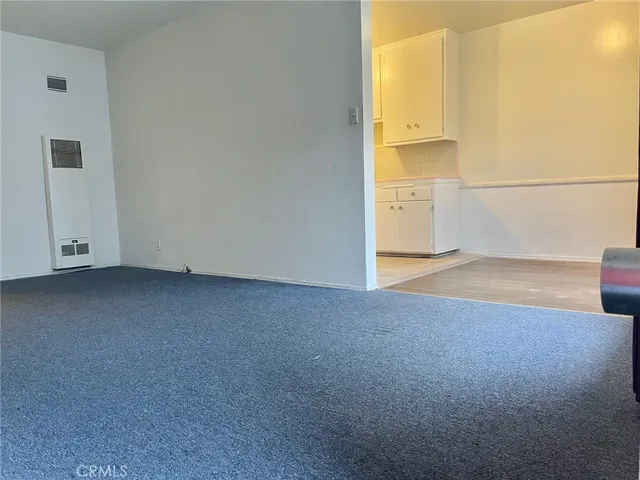 an empty room with sliding door