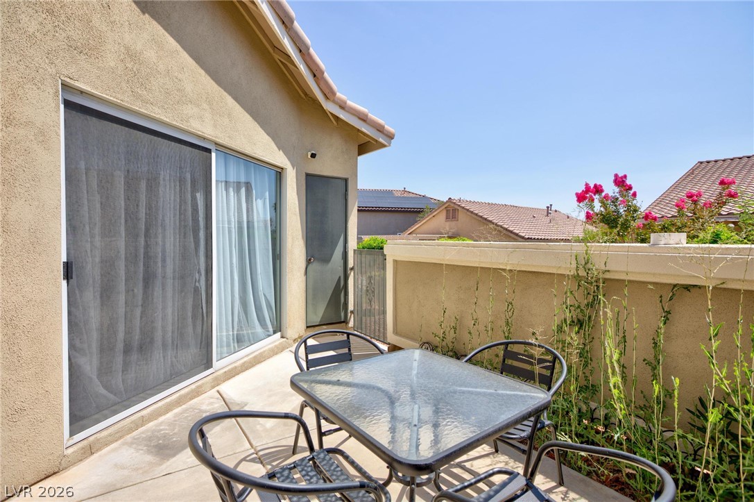 3238 Mystic Ridge Court Las Vegas, NV 89129 - Photo 18 of 31 An inviting private patio offers a delightful space for outdoor relaxation and entertainment.