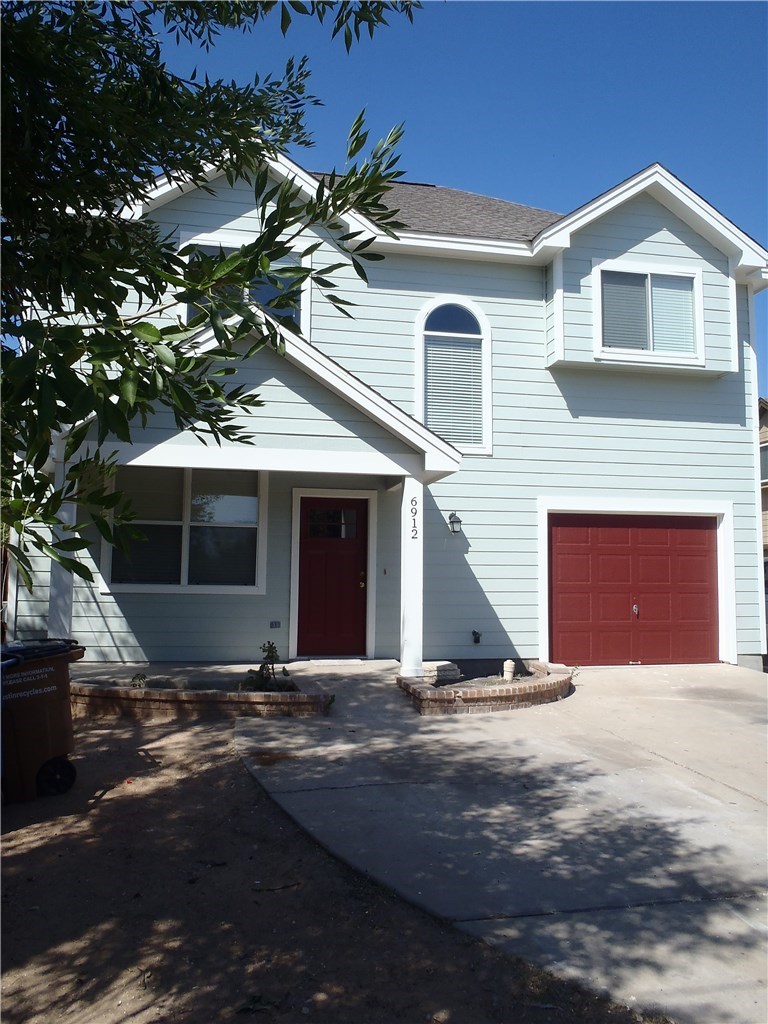 6912 Meador Avenue, Unit A Austin, TX 78752 - Photo 24 of 24 a view of a house with a yard