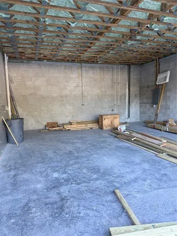 an empty room with washing machine