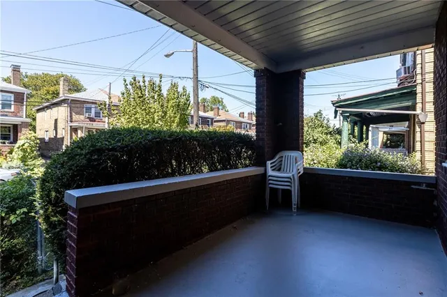 a outdoor space with lots of potted plants