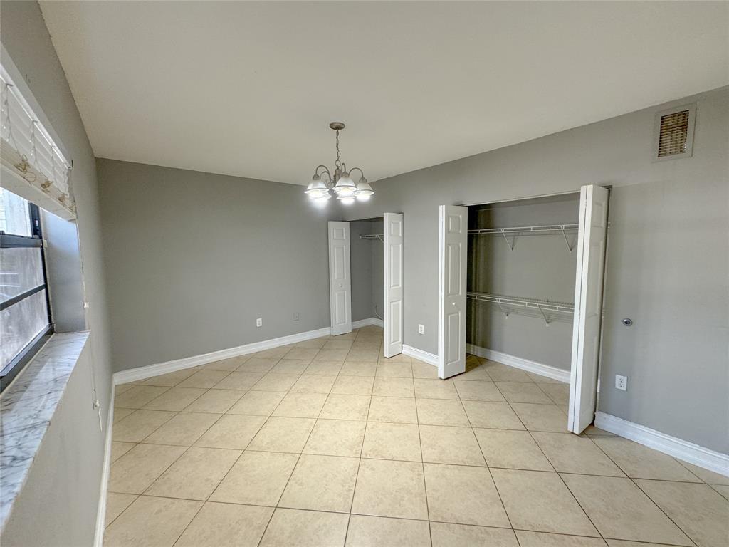 1925 Madison Street, Unit 4 Hollywood, FL 33020 - Photo 6 of 11 a view of an empty room with a bathroom