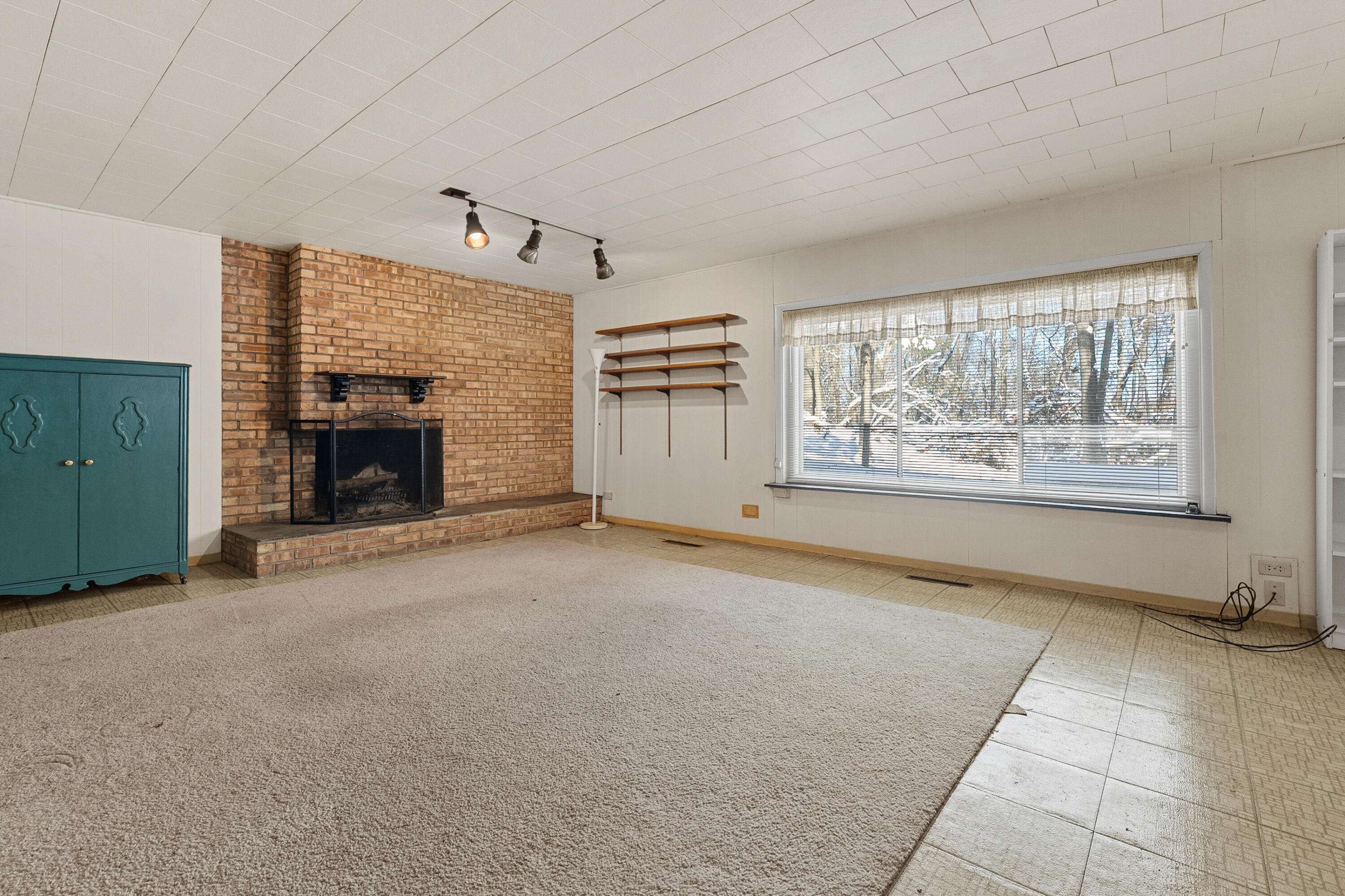 2702 Mockingbird Drive Kalamazoo, MI 49008 - Photo 21 of 36 lower fireplace
