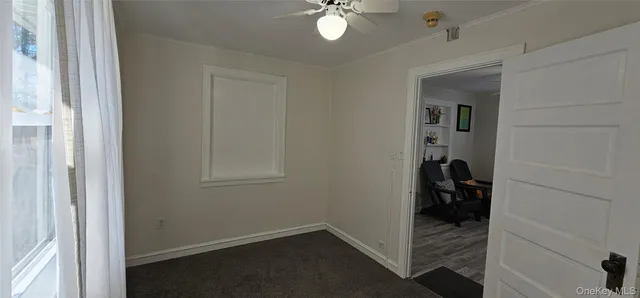 a view of a hallway and closet