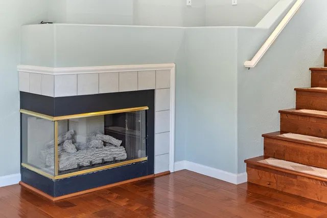 a room with furniture and a fireplace