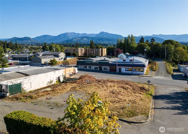 a swimming pool view with a outdoor seating