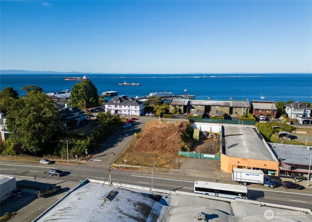 a view of a street with cars
