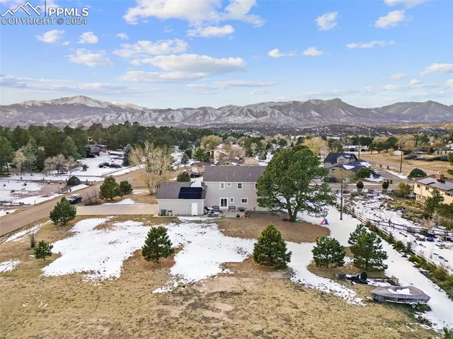 a view of a city with mountains