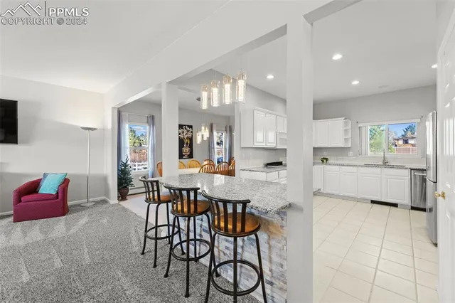 a view of a dining room with furniture