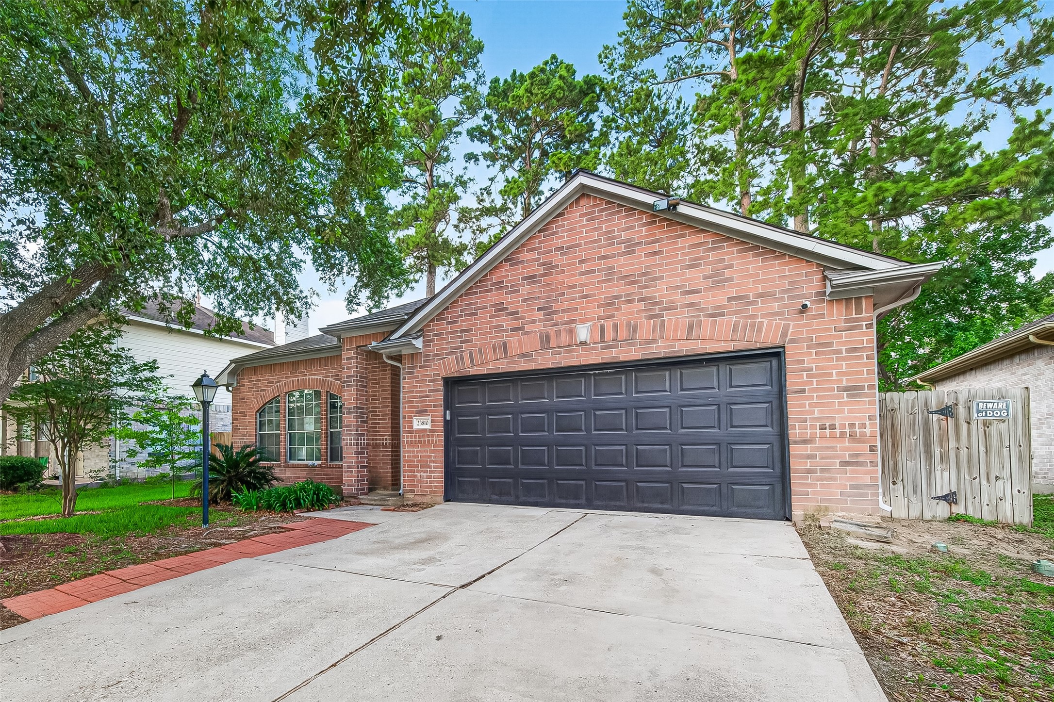 23810 Spring Way Drive Spring, TX 77373 - Photo 35 of 35 front view of house with a yard