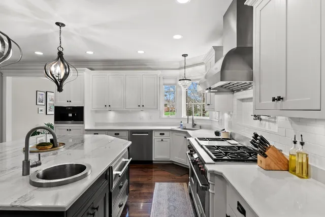 a living room with a rug and a table
