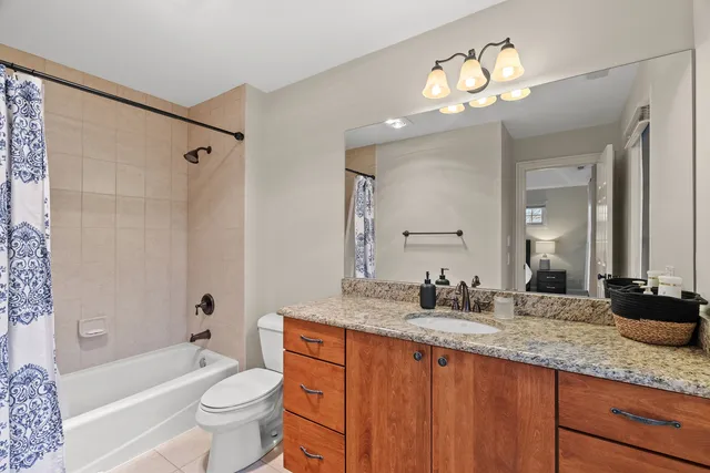 a view of a room with wooden walls